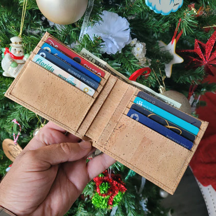 Interior view Lightweight and durable, this bi-fold wallet is crafted from premium natural cork. Waterproof and equipped with RFID protection to keep your cards safe.
