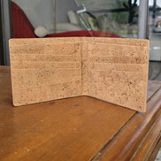 Interior view Lightweight and durable, this bi-fold wallet is crafted from premium natural cork. Waterproof and equipped with RFID protection to keep your cards safe.