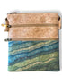 A stylish and spacious cork shoulder bag designed for everyday convenience.