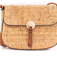 Natural cork crossbody bag front view with gold button detail and adjustable strap