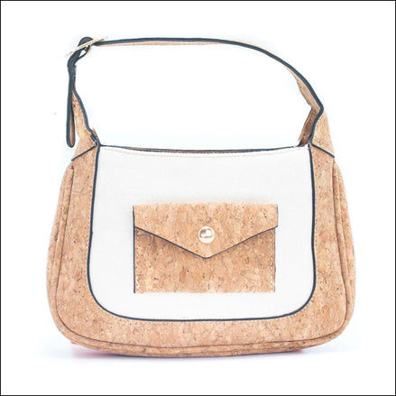 Cork hand or shoulder bag with white cotton front and cute mailer pocket.