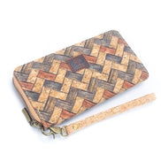 Cork wallet with herringbone pattern and strap on a white background