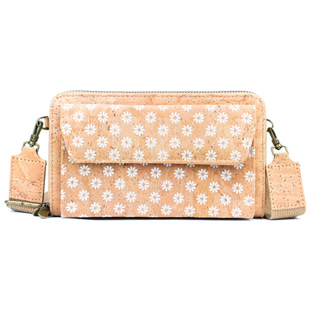 Cork crossbody bag with white floral pattern on a white background