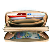 Open beige wallet with cards and money on a white background