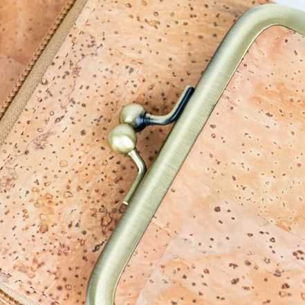 Keep your essentials organized in sustainable style with this compact, eco-friendly Cork Phone Bag and wallet. 