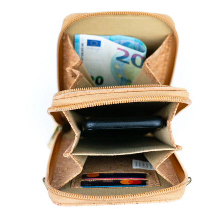 Interior view Keep your essentials organized in sustainable style with this compact, eco-friendly Cork Phone Bag and wallet. 