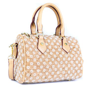 Floral Cork Crossbody Barrel Bag front view with daisy pattern and leather handles