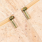 Close up antique brass hardware cork crossbody bag