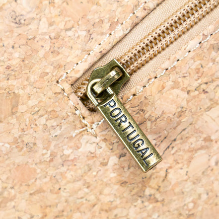 Close up antique brass hardware cork crossbody