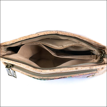 Interior view  of natural cork crossbody bag with colorful tile pattern and triple zipper design