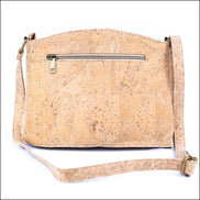 Bottom view of natural cork crossbody bag with colorful tile pattern and triple zipper design