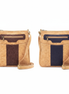 Two cork crossbody bags on white background