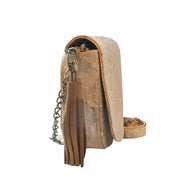 Natural cork crossbody bag with gold flake finish, front view with tassel and detachable strap.