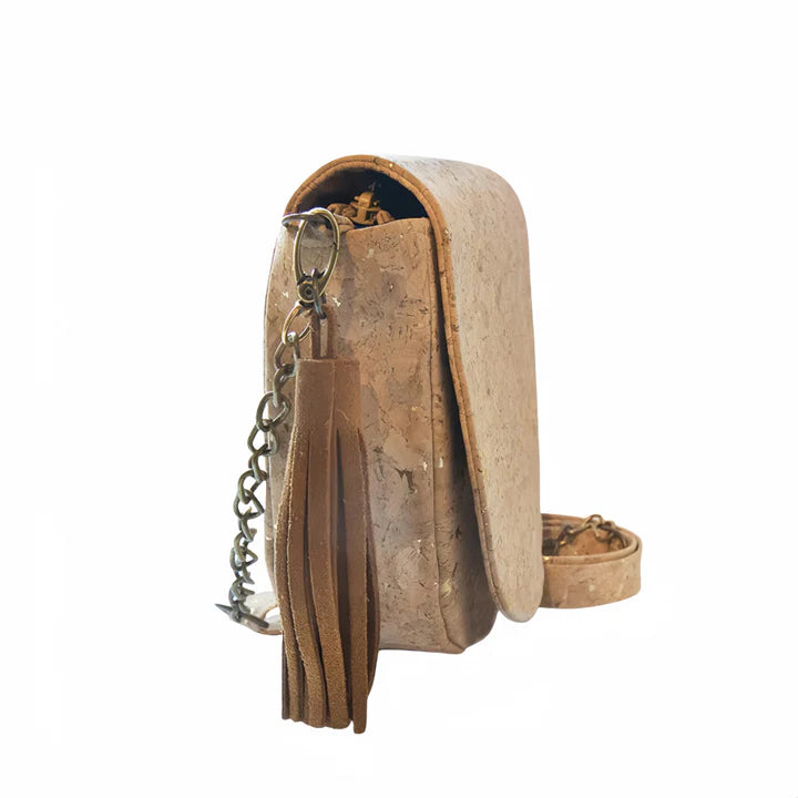 Natural cork crossbody bag with gold flake finish, front view with tassel and detachable strap.