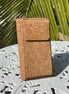A compact adjustable strap crossbody and wallet in one, designed for hands-free convenience with timeless natural cork texture. 