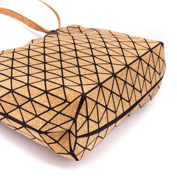Bottom of Stylish geometric design tote or shoulder bag with natural cork texture and large interior compartment for wallet, tablet, notebooks & more.