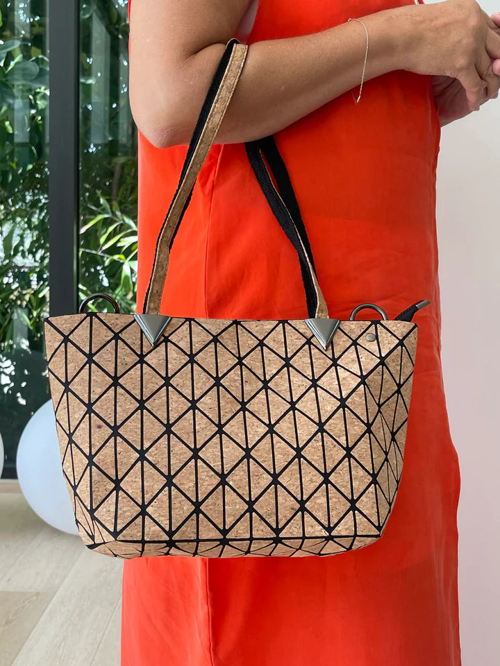 Stylish geometric design tote or shoulder bag with natural cork texture and large interior compartment for wallet, tablet, notebooks & more.