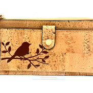 A luxurious soft cork wallet with a wristlet strap, perfect to keep your cards and cash neatly organized.