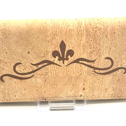Cork wallet with decorative design on a white background