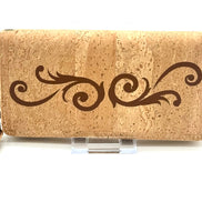 Cork wallet with decorative swirls on a white background