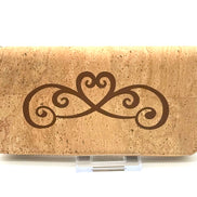 Cork wallet with decorative heart design on a white background