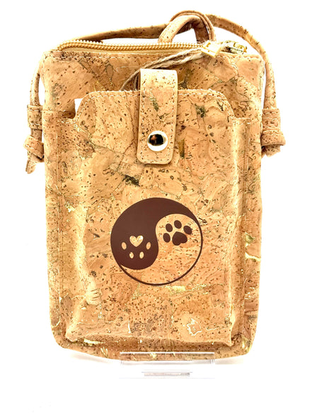 Cork pouch with a yin yang design featuring a heart and paw print on a white background