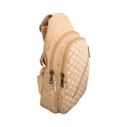 Natural cork sling bag with white daisy print and diagonal zip pocket